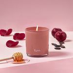 furn. Bee Deco Divine Bergamot, Honey, Plum + Tonka Scented Glass Candle in Blush