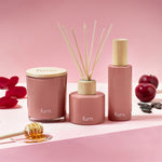 furn. Bee Deco Divine Bergamot, Honey, Plum + Tonka Scented Glass Candle in Blush