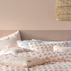 Linen House Haze Tufted Pillowcase in Peach