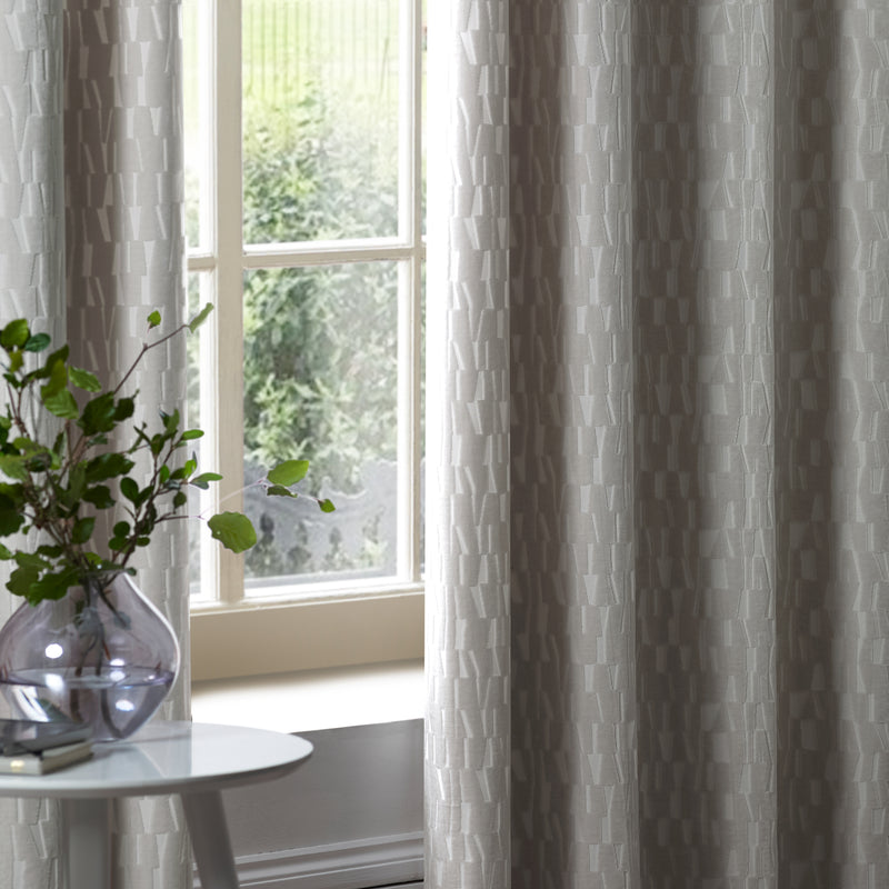 Geometric Grey Curtains - Manhattan Velvet Room Darkening Eyelet Curtains Silver Paoletti