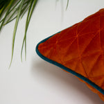 Paoletti Quartz Quilted Cushion Cover in Jaffa Orange/Teal