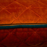 Paoletti Quartz Quilted Cushion Cover in Jaffa Orange/Teal