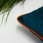 Paoletti Quartz Rectangular Quilted Cushion Cover in Teal/Jaffa